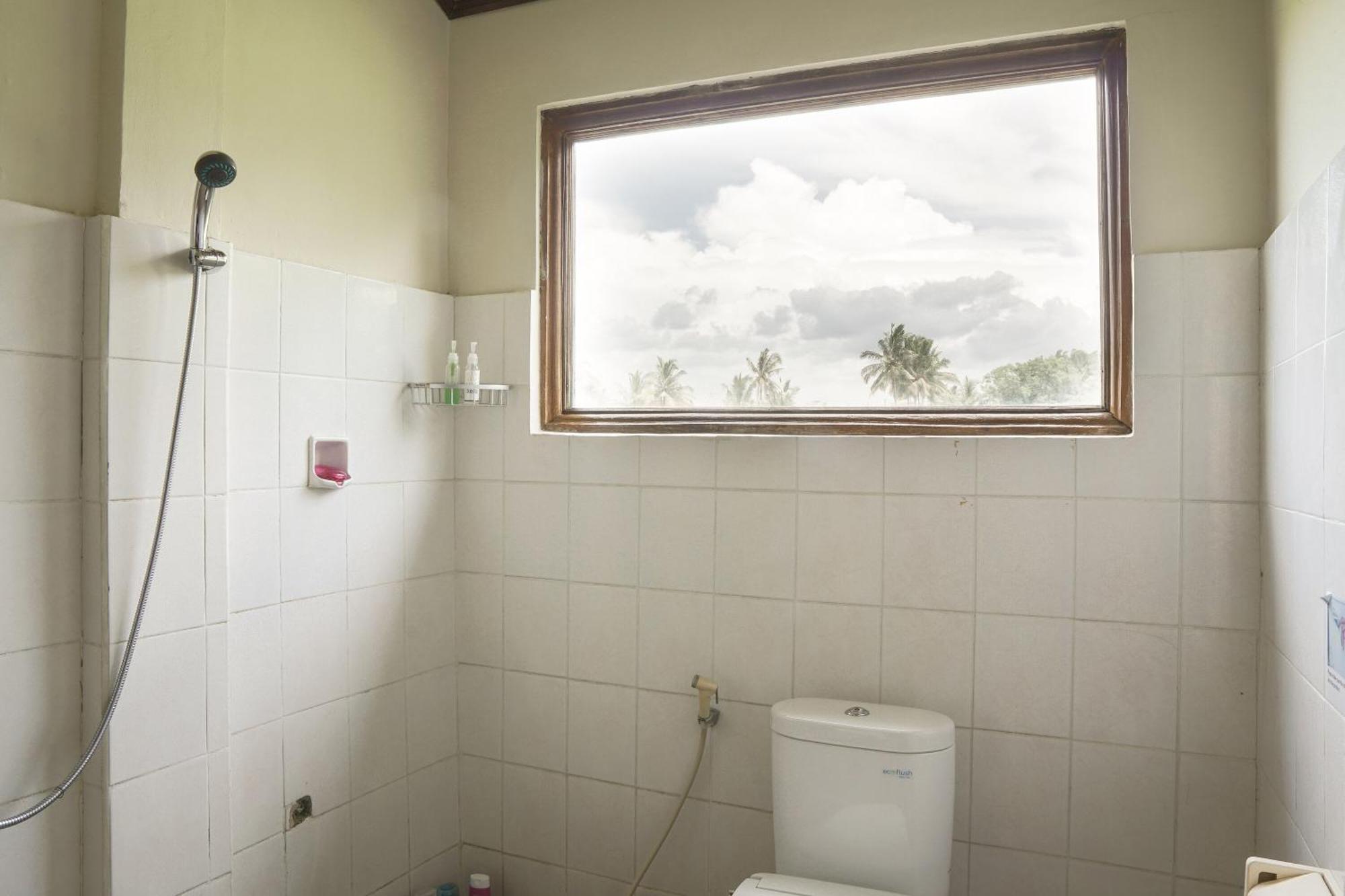 Nirwa 1 Ubud Guesthouse Номер фото